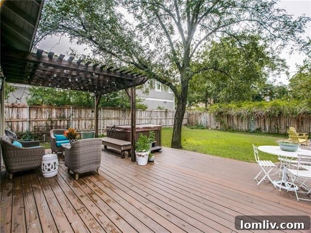 Serene backyard setting with mature trees and ample green space.