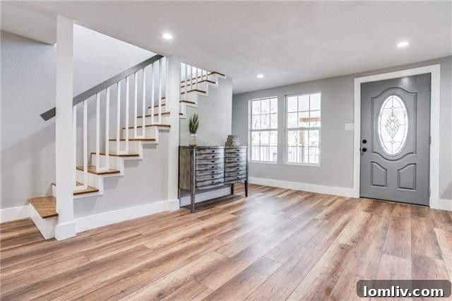 Newly relocated staircase with elegant design and integrated storage