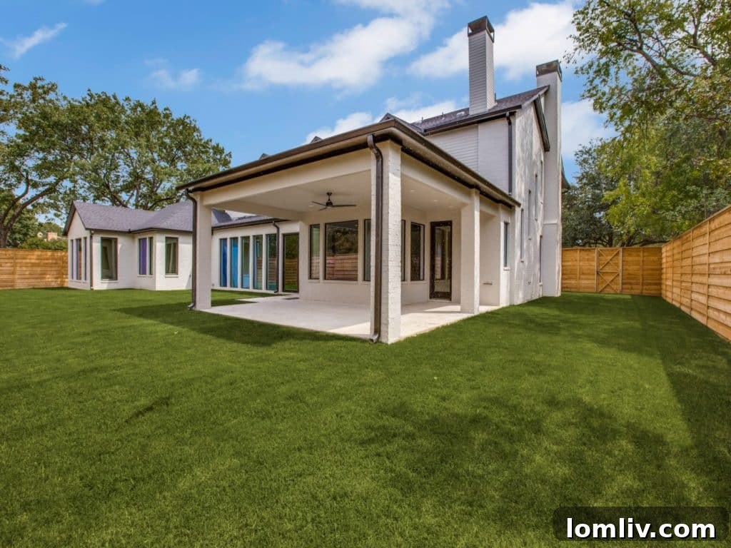 Massive Covered Patio and Rolling Lawn in Backyard