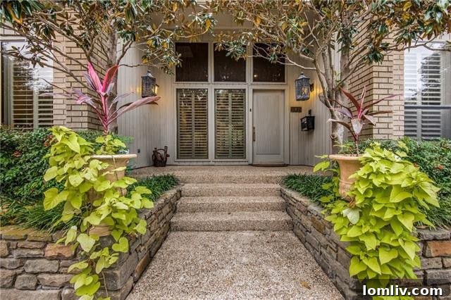 Elegant contemporary ranch exterior at 10819 Pagewood Place, Dallas