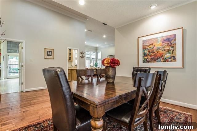 Inviting family room with stunning stone fireplace and modern decor