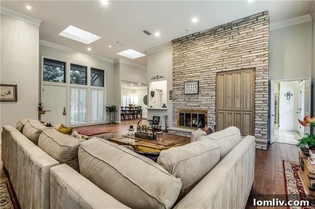 Formal dining room with elegant lighting and ample space