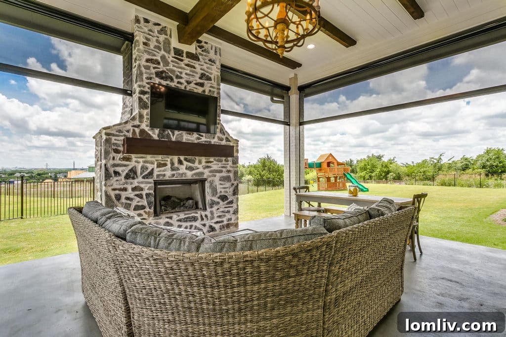 Outdoor stone fireplace at 5205 Caliza Court, ideal for Texas winters but not Santa's entry