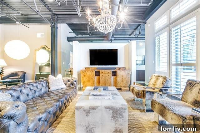 Chic bedroom area in the West Village loft, featuring stylish decor.