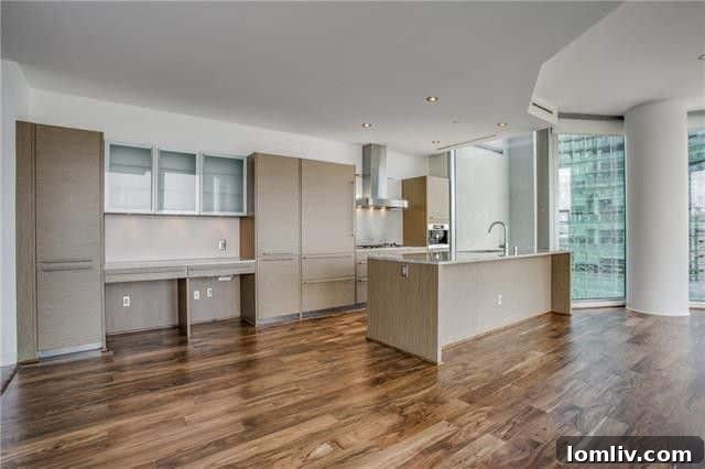 The luxurious kitchen in the Azure condo, equipped with high-end appliances.