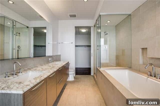 Spacious bedroom with city views and ample natural light in the Azure condo.