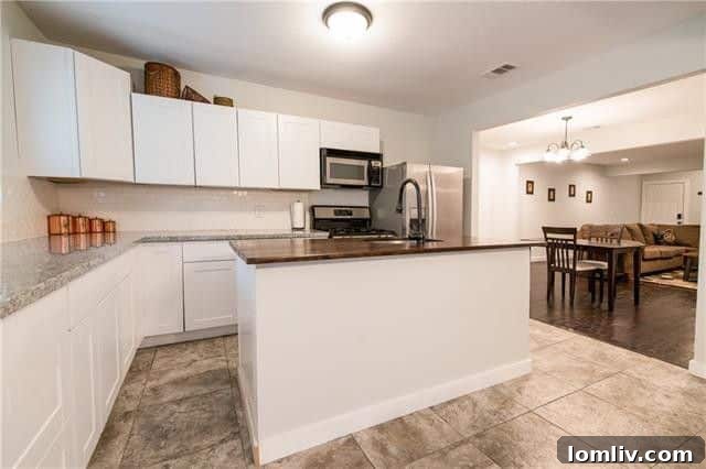 Modern kitchen with stainless steel appliances and ample cabinet space