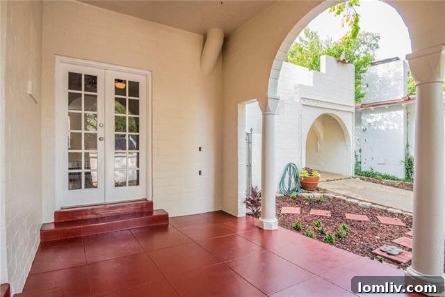 Grand exterior view of 1846 Mayflower Drive, a historic Spanish mansion
