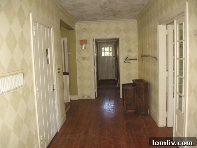 Spray-painted arrows on the walls of the house