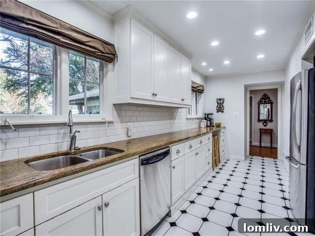 Well-maintained private backyard with mature trees and green space at a Dallas home