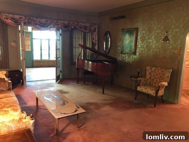 Another view of the living space with original detailing