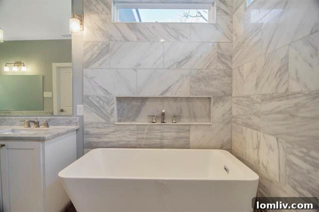Close-up of the elegant dual vanities with stylish sinks and fixtures in the master bathroom, showcasing refined taste and functionality