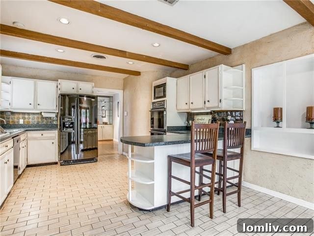 East Kessler Cottage: A Captivating Charmer 8 Spacious kitchen with ample counter space and cabinetry, Dallas cottage