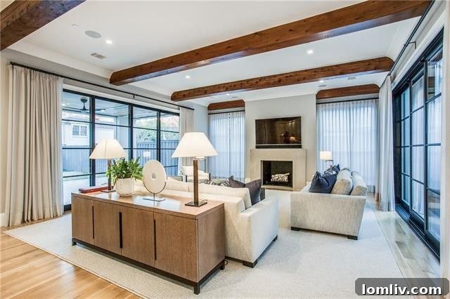 View of the home's exterior from a different angle, showcasing its architectural grandeur at 3414 Beverly Drive