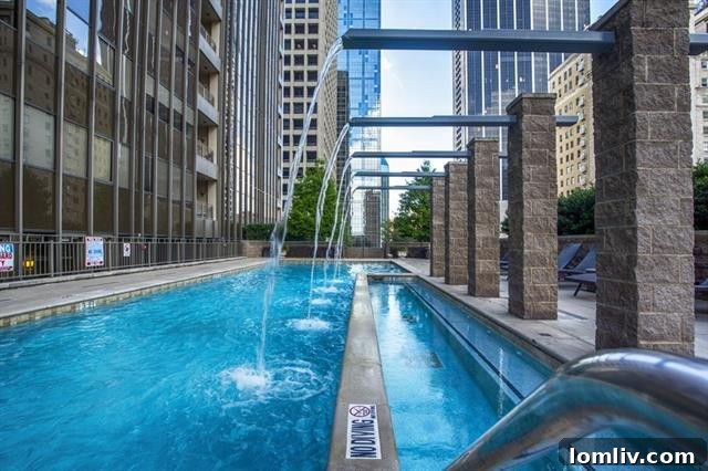Living room with a stunning view of the Dallas skyline from The Metropolitan