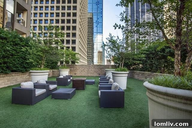 Rooftop swimming pool with city skyline views at The Metropolitan