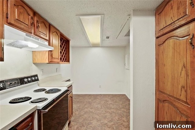 Cozy eat-in kitchen area and a surprising pantry space in Turtle Creek Terrace condo.