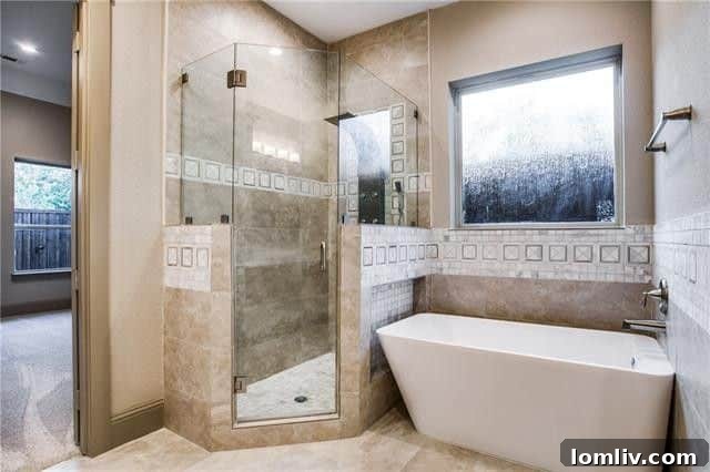 Master bathroom with separate shower and soaking tub