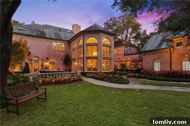 A closer view of the entrance and part of the main facade of the T.D. Jakes former home, emphasizing its stately presence in Dallas.