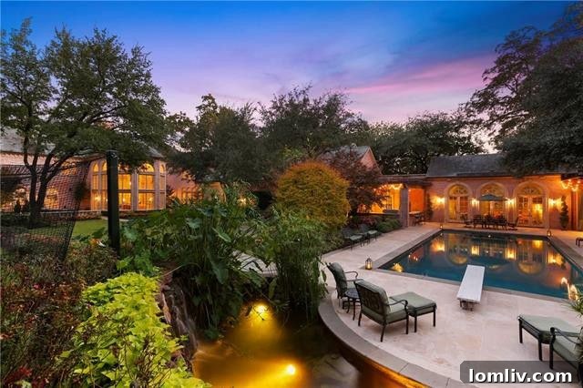 Aerial perspective revealing the full grandeur of the White Rock Lake estate, including portions of its vast acreage and lake proximity.