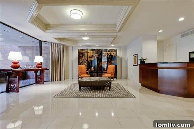 3621 Turtle Creek Blvd Apt 4L - The recently refreshed, grand lobby and elegant hallways of The Beverly residence.