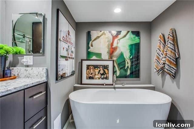 3621 Turtle Creek Blvd Apt 4L - A vibrant and eclectic art collection enhances the sophisticated living space, reflecting personal style.