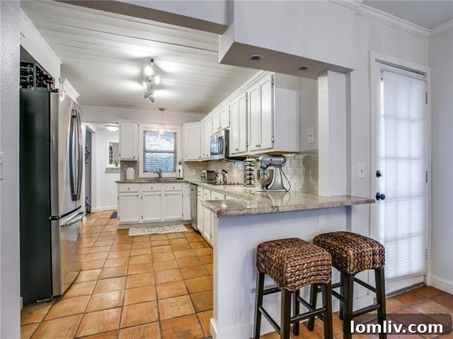 Elegant dining area adjacent to the kitchen, perfect for entertaining