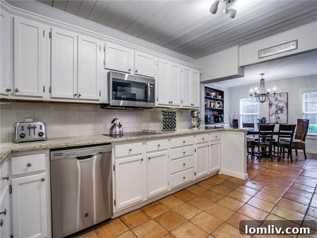 Modern kitchen with stainless steel appliances and ample cabinet space