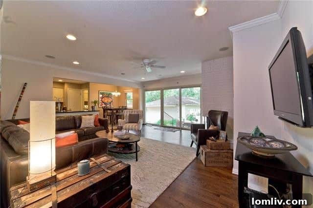 Catch Four Must See Houses This Weekend 10 Dining area with large windows showcasing natural light and garden views