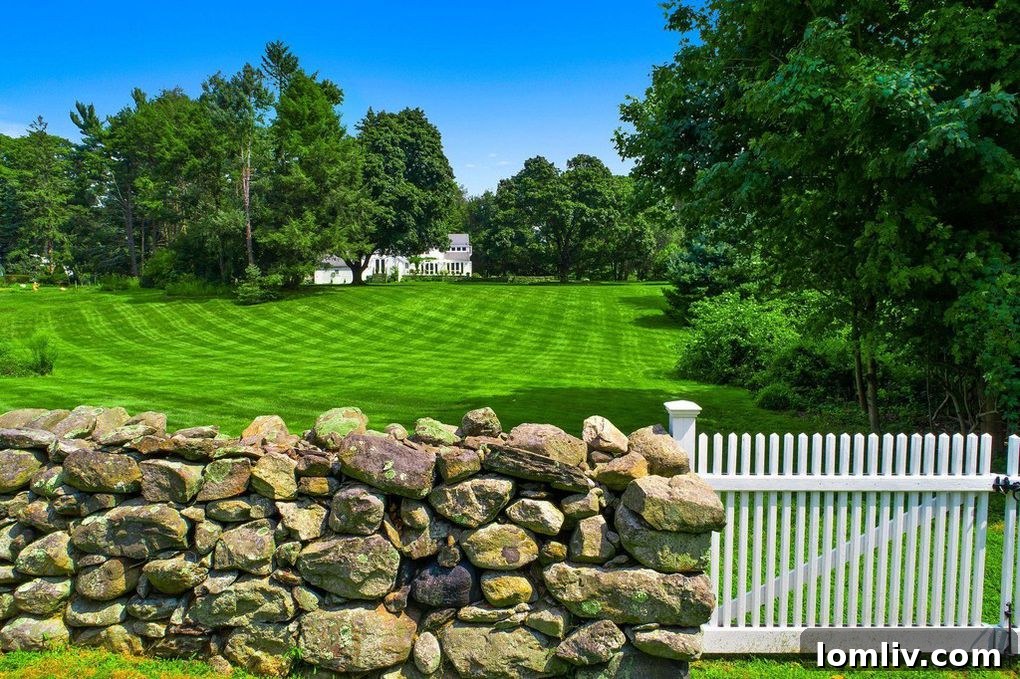 Exterior view of the historic Mary Martin estate, showcasing its classic Colonial architecture and pristine grounds