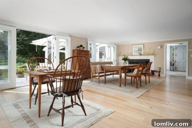 Manicured lawns and vibrant gardens surrounding the historic Norwalk, CT property