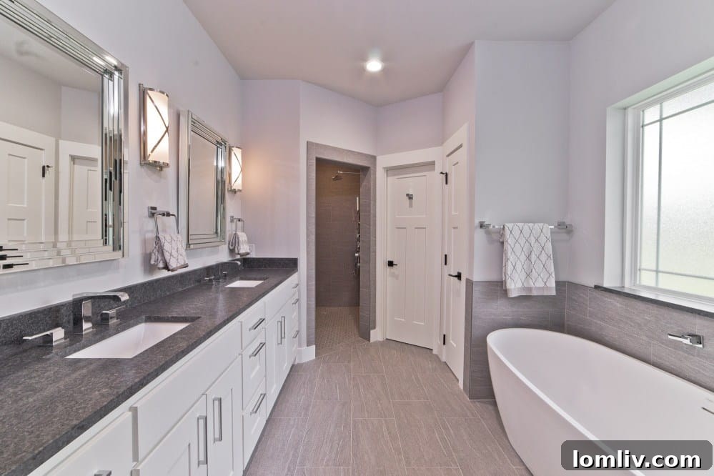 Master Bedroom with Tray Ceilings and Hardwood Floors