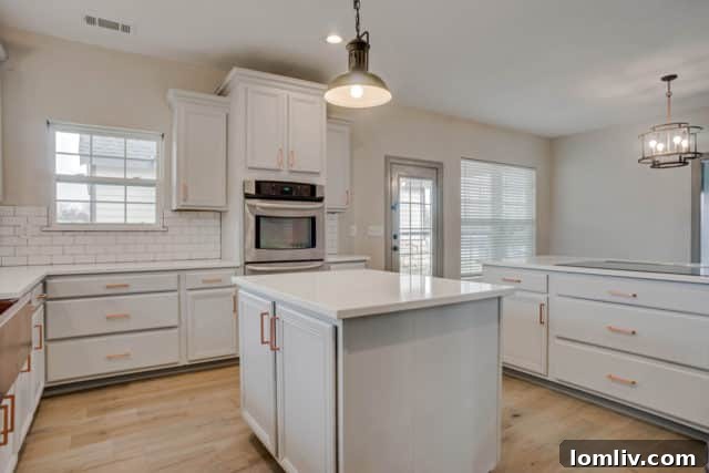 Elegant dining area adjacent to the modern kitchen in the Midlothian renovation
