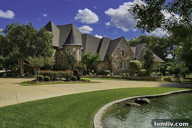 Aerial View of Colleyville Estate with Circular Drive and Lush Landscape