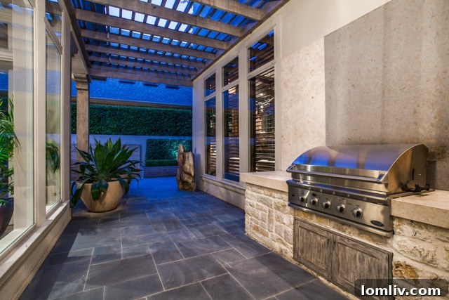 Sophisticated living area with fireplace and comfortable seating in the Dallas luxury home