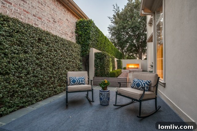 Bright and spacious breakfast nook with fireplace and views of the garden