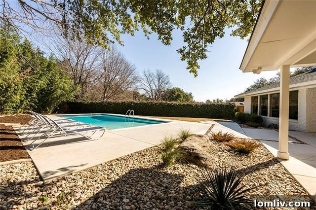 Sparkling swimming pool in the backyard, perfect for entertaining
