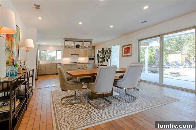 Newly renovated kitchen with silvery oyster cabinetry and quartz countertops