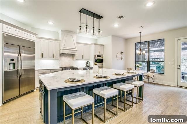 Gourmet Kitchen with Marble Island and Stainless Steel Appliances