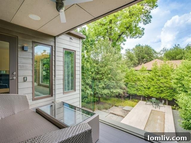 Balcony with a clear glass safety panel overlooking the gardens