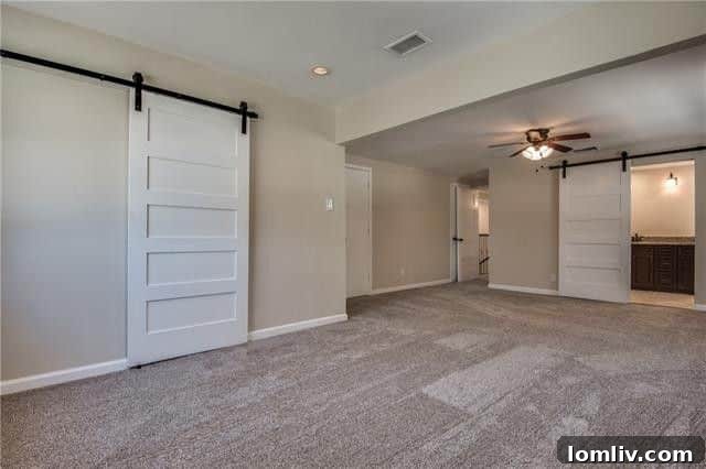 A Trio of Distinctive Las Colinas Casas 21 University Hills Master Bedroom with Barn Doors