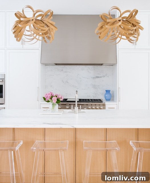 Airy organic kitchen with sleek white and warm wood finishes.
