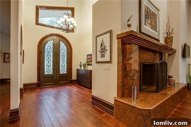 Spacious living room with natural light and contemporary fireplace