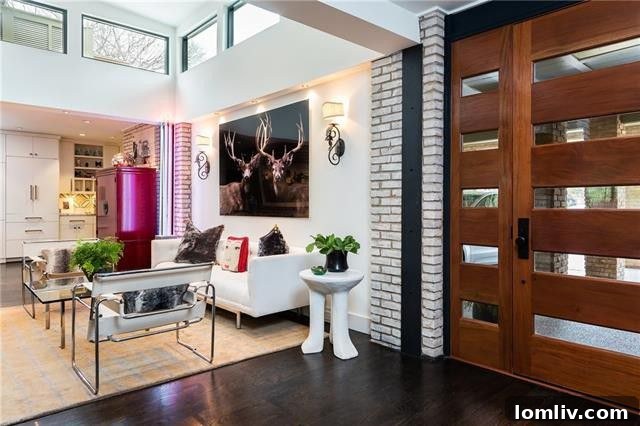 Elegant dining area adjacent to the living space, featuring parquet floors