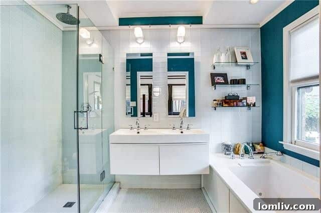 Totally Enchanted by This Hollywood Heights Tudor 15 Luxurious Spa Bathroom with Floating Double Sink Vanity and Teal Walls