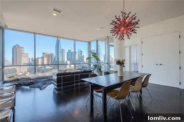 Modern dining area with city views in Victory Park condo