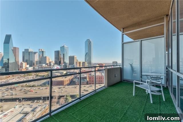 Open plan living space with contemporary design and skyline views