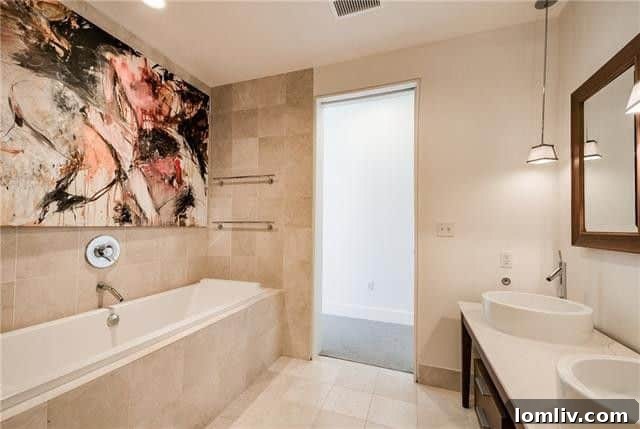 Walk-in shower with high-end tiling and glass enclosure