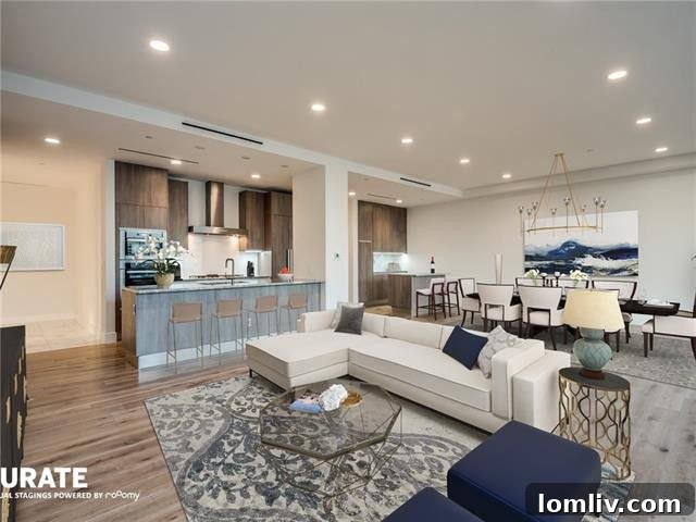 Open concept living room with modern furnishings and expansive windows
