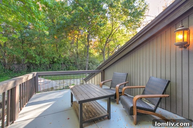 Master suite balcony overlooking a reflection pond, perfect for morning coffee or an evening drink